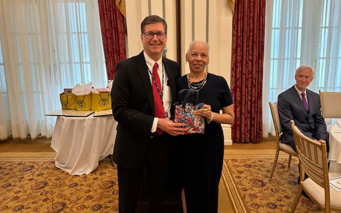 Dr. Belyea standing with an ophthalmology department member